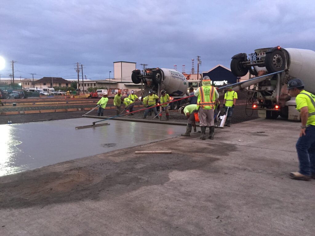 Mana crew placing and finishing a concrete pour